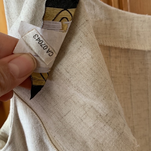 Cream and Black Dress with Elegant Design - Picture 9 of 11